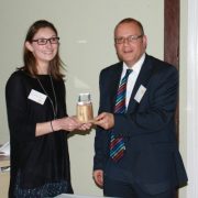 Becky Casement of ECT accepting the Making a Mark competition award from James Evans