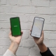Two hands holding mobile phones showing the CoGo app