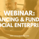 Image of a a group of people sat talking at a board table with text overlay: 'Webinar: Financing & Funding Social Enterprise'''