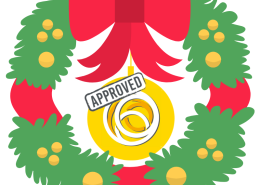 Christmas wreath with a yellow bauble in the middle with the Social Enterprise Mark 'approved' logo
